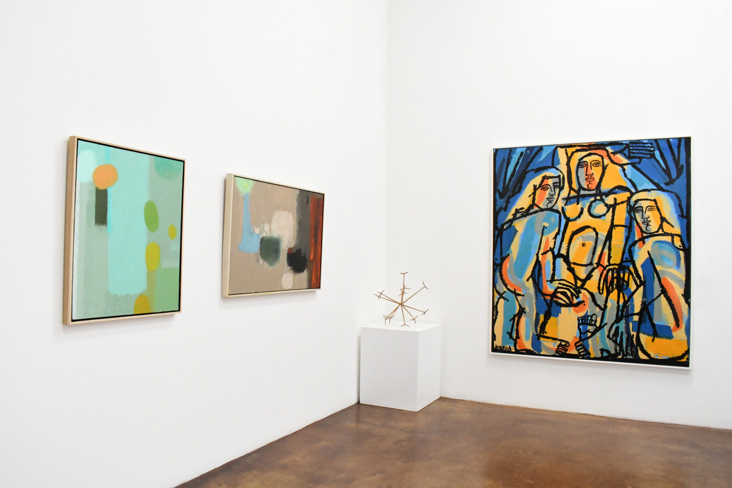 installation photograph of abstract paintings