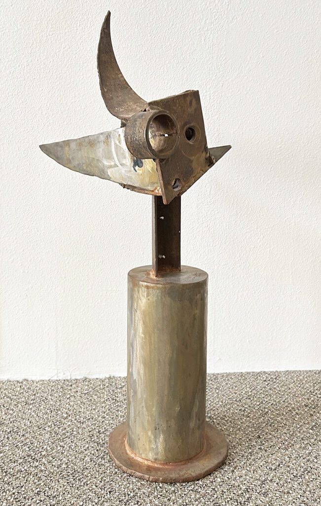 metal sculpture of a woman by Ron Lopez